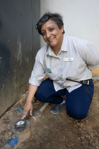 Stodels Bellville branch manager checks a water meter to monitor water consumption